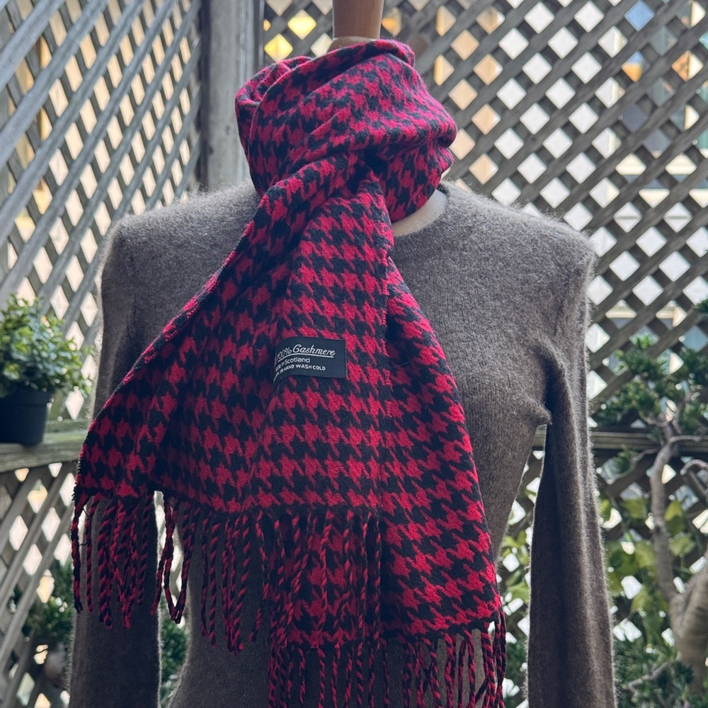 100% Cashmere Scarf. Red & Black Houndstooth. 
68” X 13”, 3”fringe Unisex. NWOT